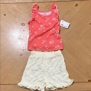 OshKosh B'gosh Coral and Cream Kids Matching Set
Shorts are generic brand